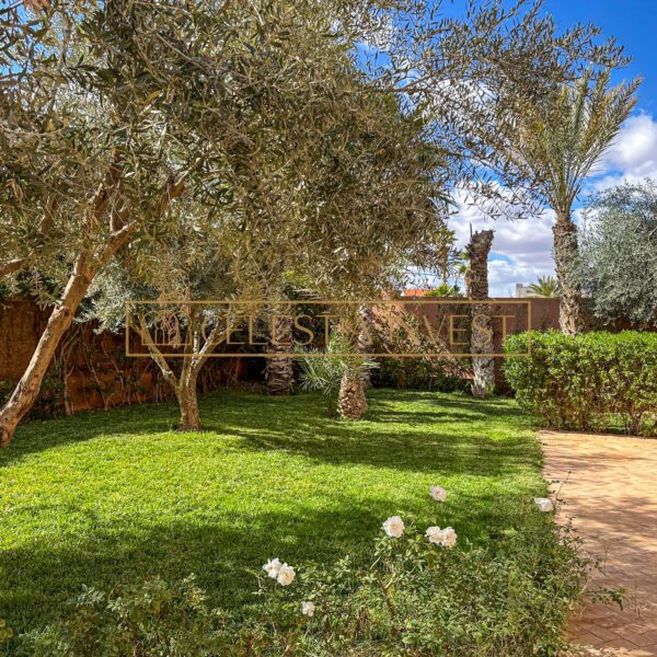 Peaceful garden with olive trees and landscaping in luxury property in Marrakech