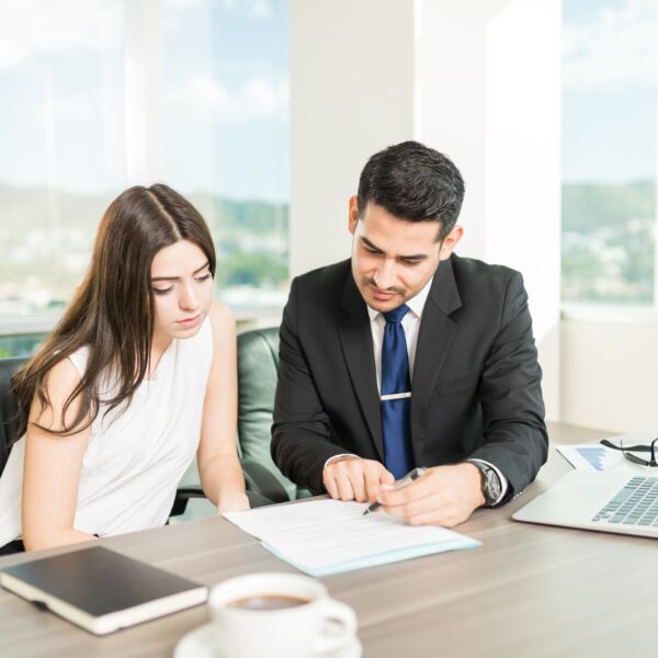 Legal advisor discussing Moroccan notary fees with a client.